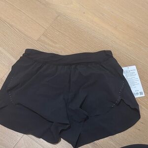 lululemon Black Athletic Shorts | fast and free high-rise split short 3” size M